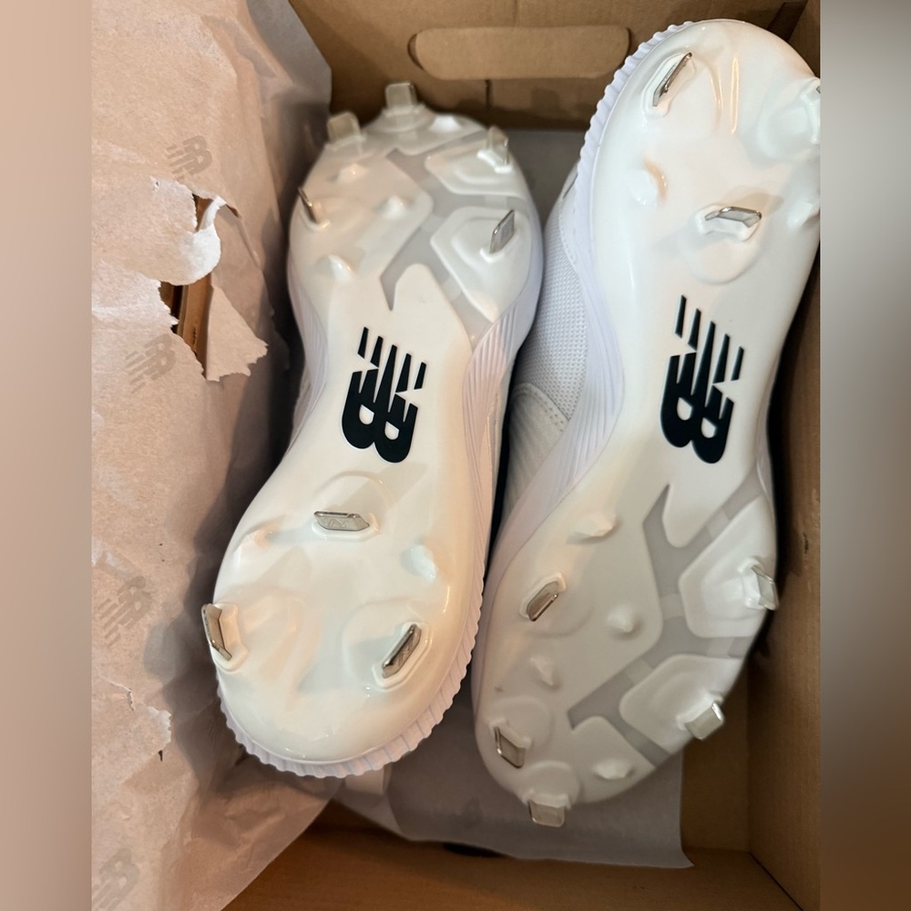 New Balance metal cleats